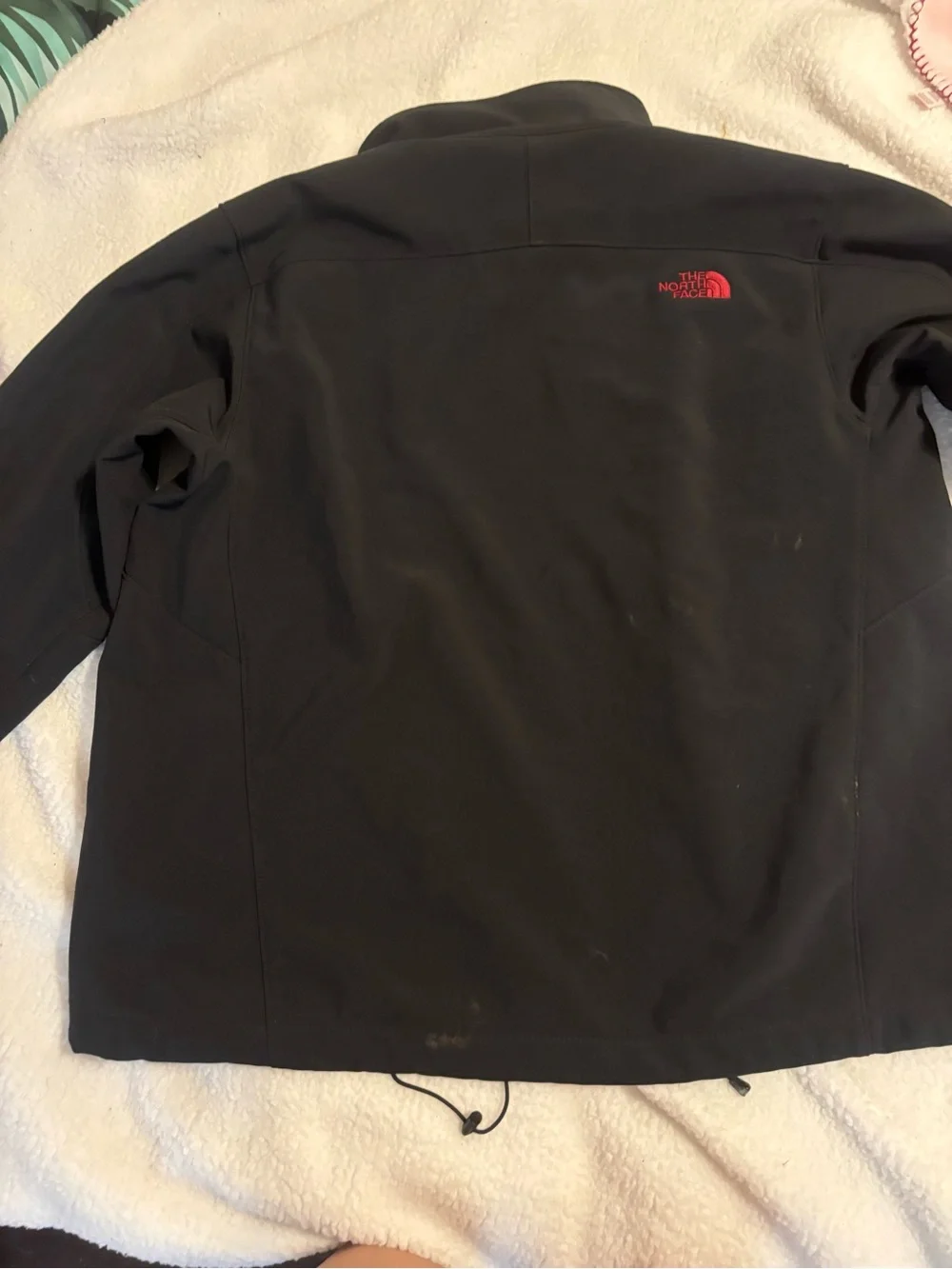 The North Face Men's Black Jacket with Red Accents